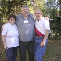 Skyscrapers President Dave Huestis and his wife Tina with Story Musgrave