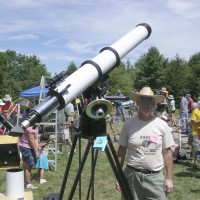 Dick Parker standing with his home made 6