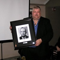 Dave Hustis is recognized for completing three 2-year terms at President of Skyscrapers at the 75th