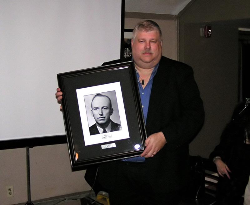 Dave Hustis is recognized for completing three 2-year terms at President of Skyscrapers at the 75th