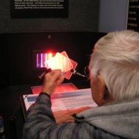 Tom Barbish studies spectra at Kitt Peak Visitor's Center