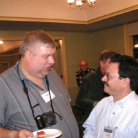 Dave Huestis and Joel Cohen at December 2005 Meeting & Holiday Party