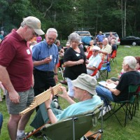 Gerry Dyck shows his wind instrument at July 2006 Cookout