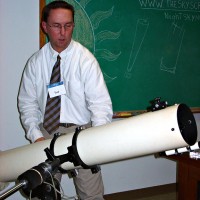 Ted Ferneza demonstrates telescopes at a star party