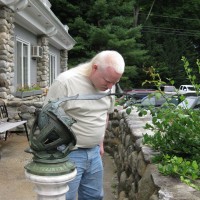 Jim Hendrickson looks through a replica Porter Garden Telescope